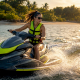 Woman riding jet ski in calm bay