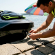 Rider adjusting jet ski tow rope on dock