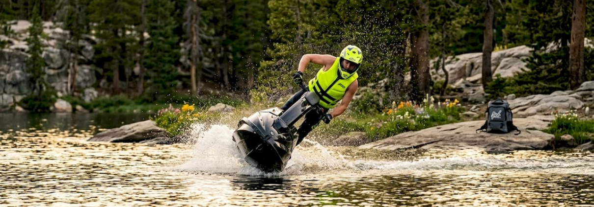 Jet ski rider performing freestyle trick