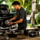 Mechanic installing jet ski modification parts