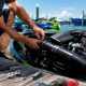 Mechanic installing jet ski cooling hose