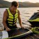 Man preparing jet ski wake surfing gear outdoors