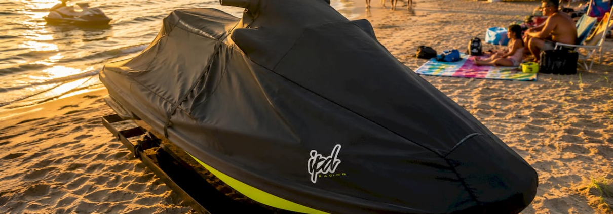Watercraft covered with protective cover at marina