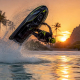 Jet ski rider performing barrel roll on lake