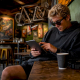 Person browsing jet ski parts outdoors