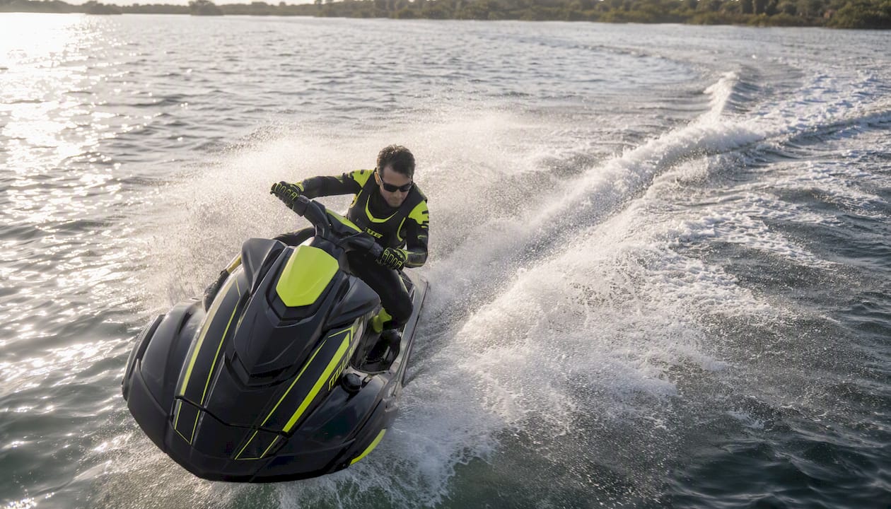Jet ski rider testing performance on water