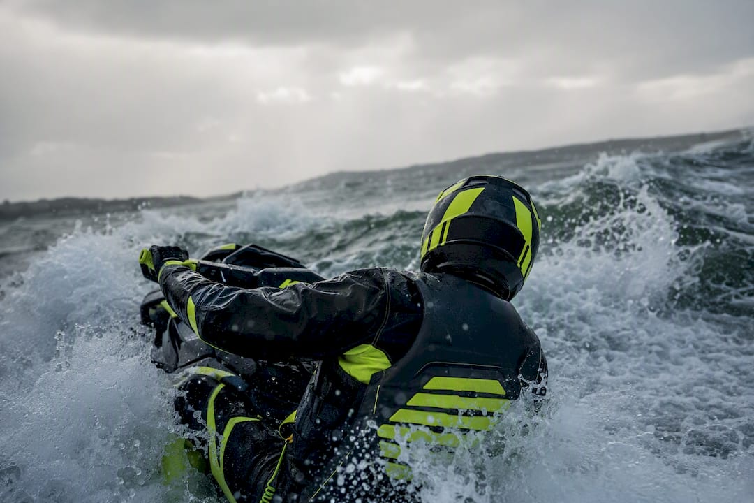PWC rider turning back in rough water