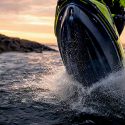 Jet ski nose rocker lifting during freestyle maneuver
