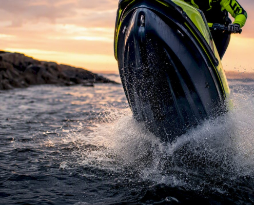 Jet ski nose rocker lifting during freestyle maneuver
