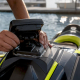Hands installing rigid GPS mount on PWC cowling