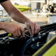 Hands maintaining jet ski cooling system parts